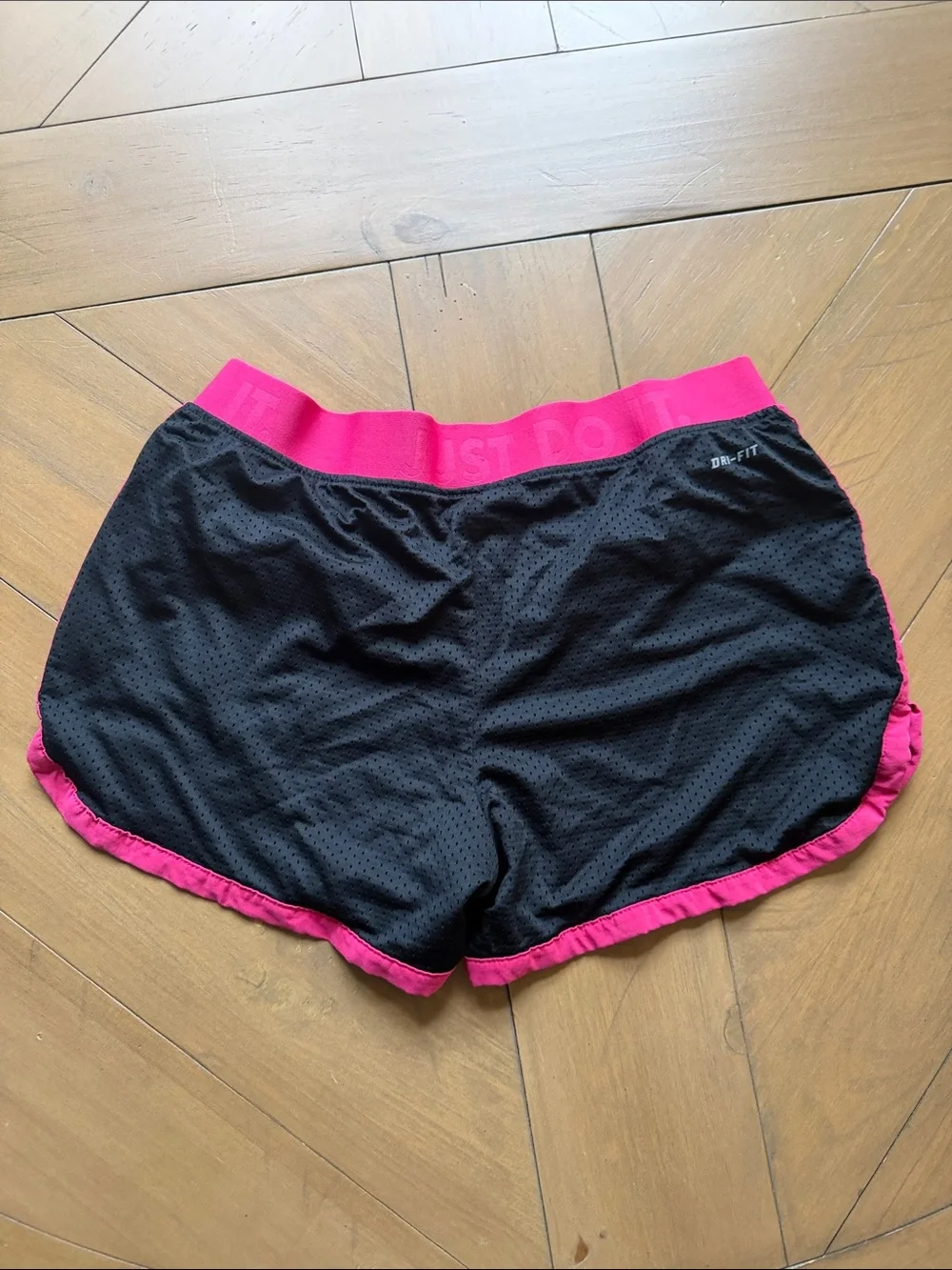 Nike Women's Black Athletic Shorts with Hot Pink Trim